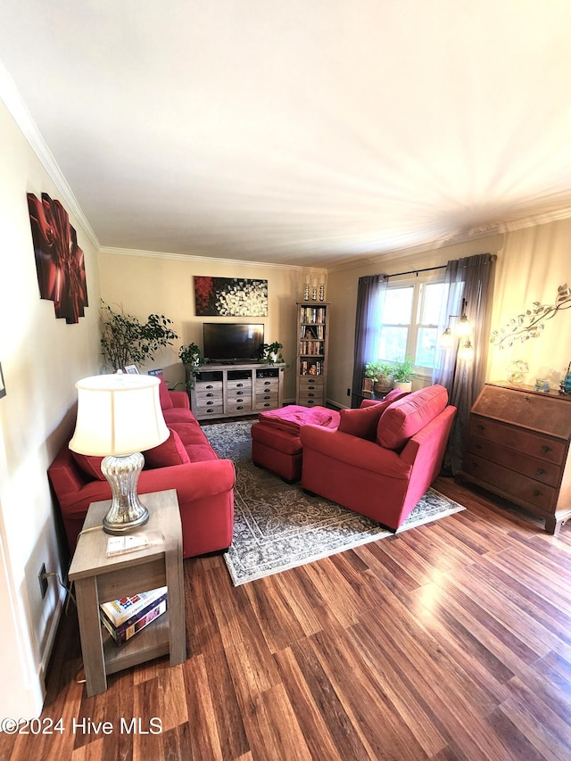 living room with crown molding and wood finished floors