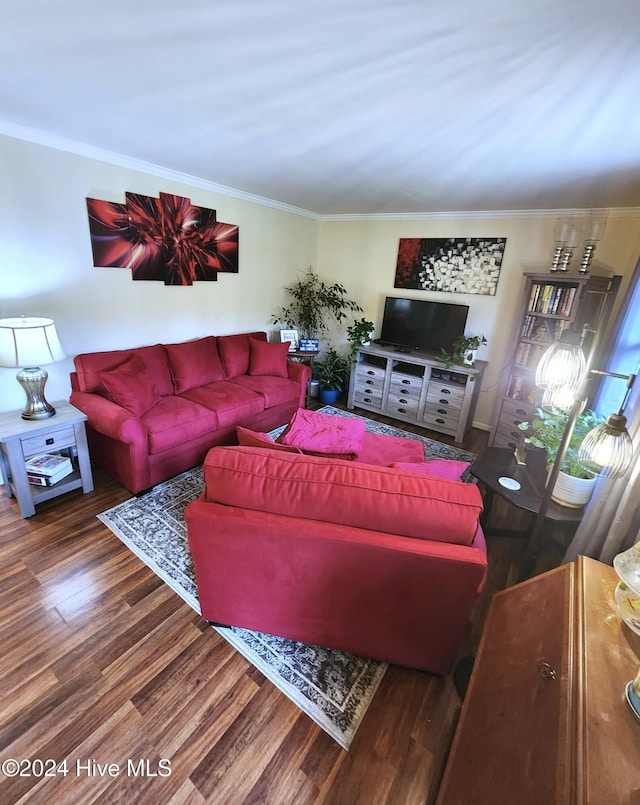 living room with hardwood / wood-style floors and crown molding