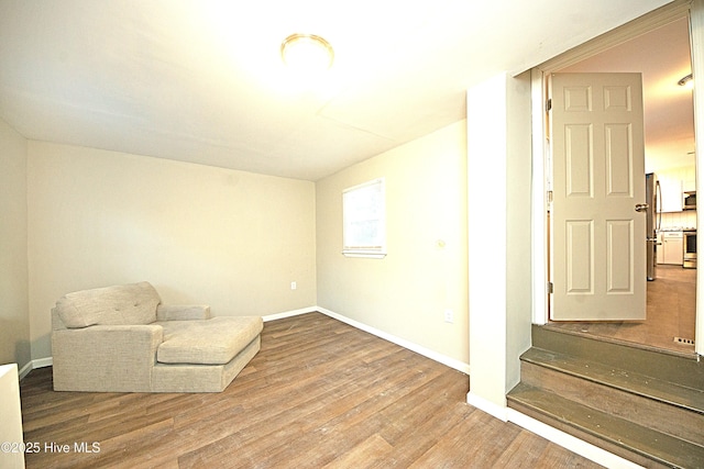 living area featuring hardwood / wood-style flooring