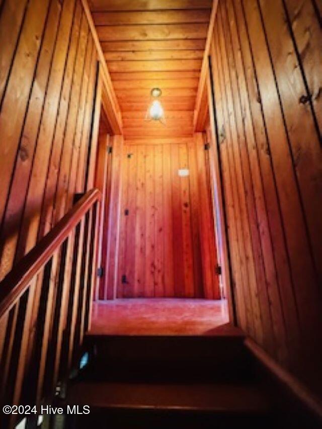 100 Riverview Ave, Camden, NC 27921 - stairway with wooden walls, wooden ceiling, and lofted ceiling