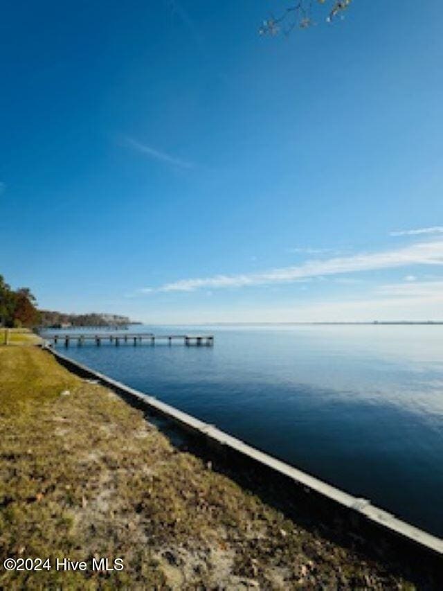 dock area featuring a water view