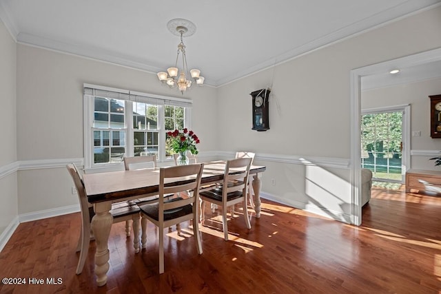 109 St Gallen Ct, New Bern, NC 28562 - dining area featuring crown molding, a chandelier, and wood finished floors