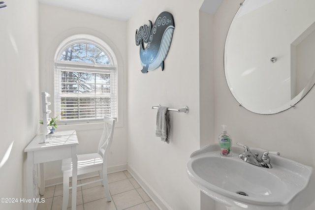 bathroom featuring sink and tile patterned flooring