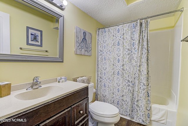 2000 New River Inlet Rd Unit 1203, North Topsail Beach, NC 28460 - full bath with vanity, toilet, a textured ceiling, and shower / bath combination with curtain