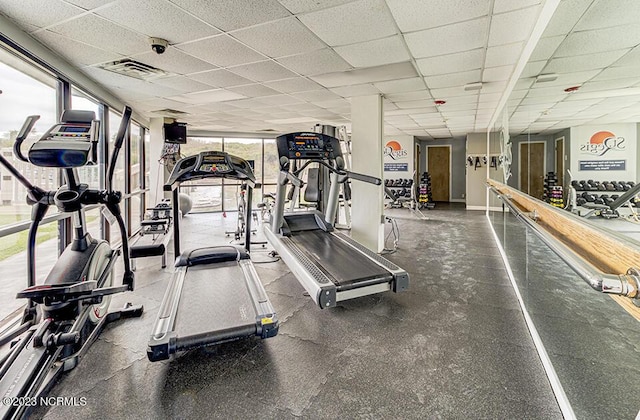2000 New River Inlet Rd Unit 1203, North Topsail Beach, NC 28460 - gym featuring a drop ceiling and baseboards