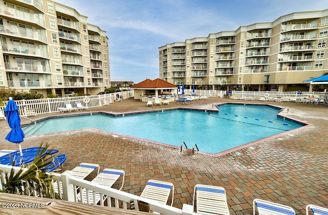2000 New River Inlet Rd Unit 1203, North Topsail Beach, NC 28460 - community pool with a gazebo and a patio area