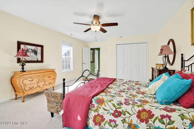 bedroom featuring carpet flooring, ceiling fan, and a closet