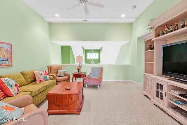 living room featuring light carpet and ceiling fan