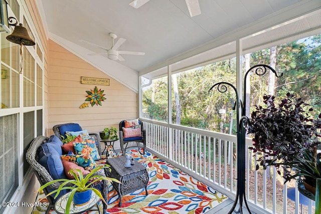 sunroom / solarium with ceiling fan