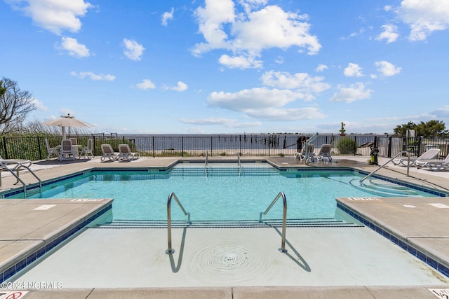 view of pool featuring a patio area