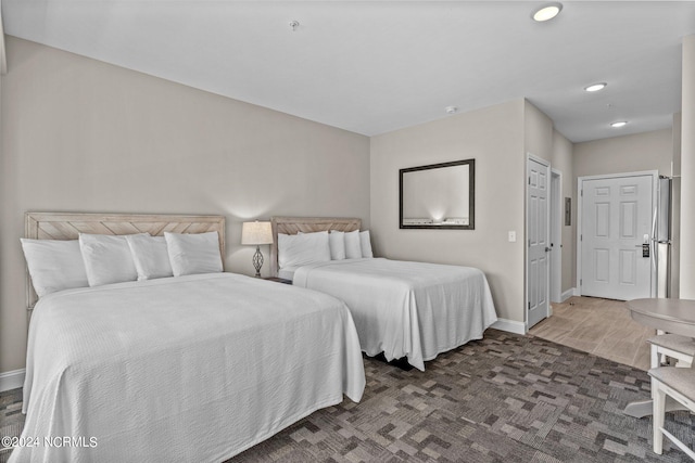 carpeted bedroom featuring a closet