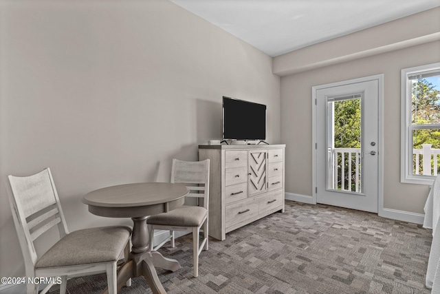 view of carpeted dining space