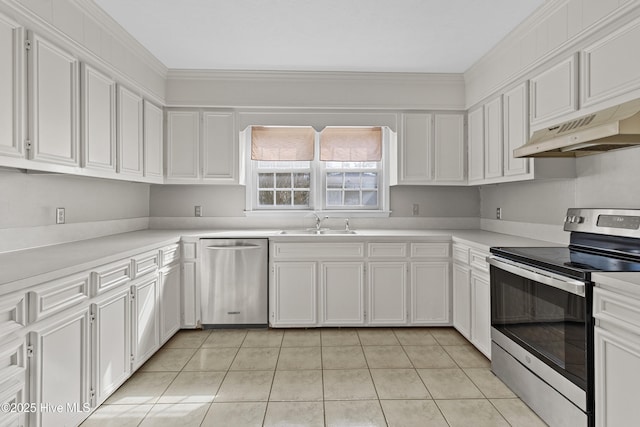 kitchen with white cabinetry, stainless steel appliances, light tile patterned flooring, and sink