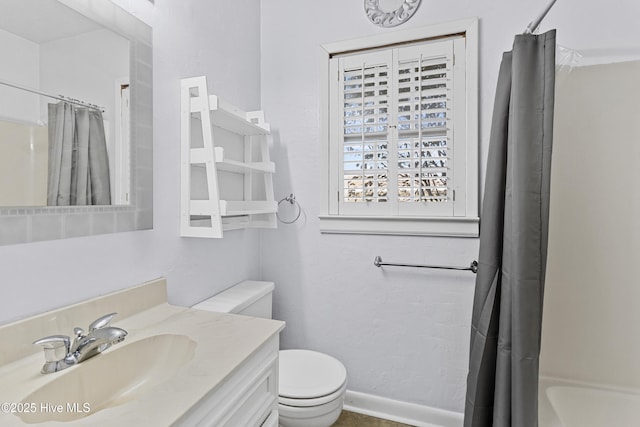 full bathroom with vanity, toilet, and shower / bathtub combination with curtain