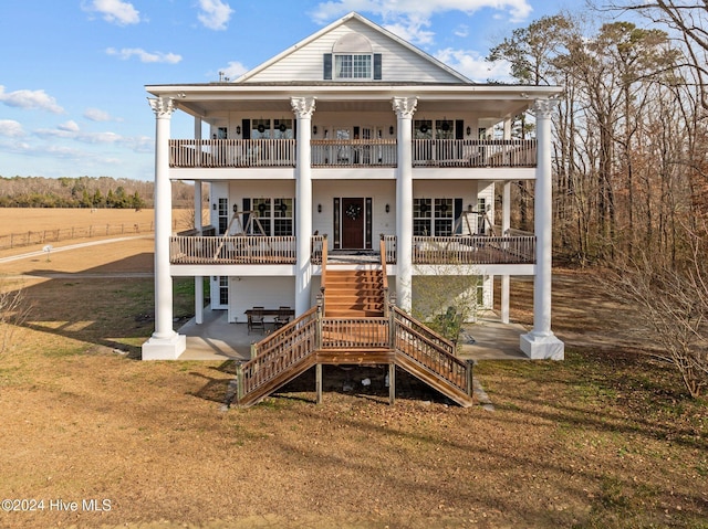 back of house with a patio area