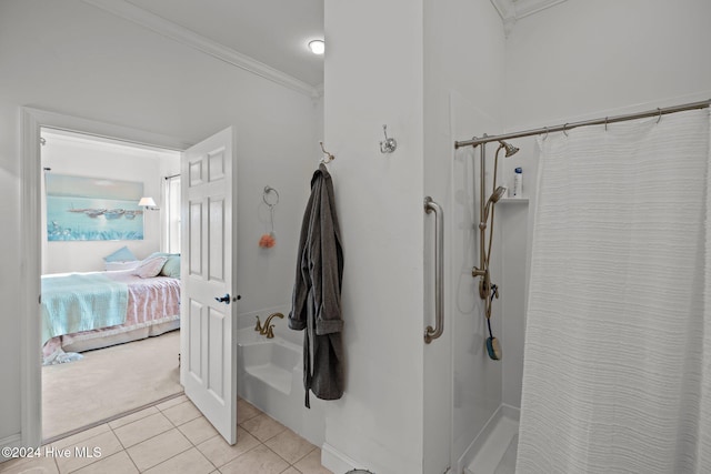 bathroom featuring tile patterned floors, crown molding, and walk in shower