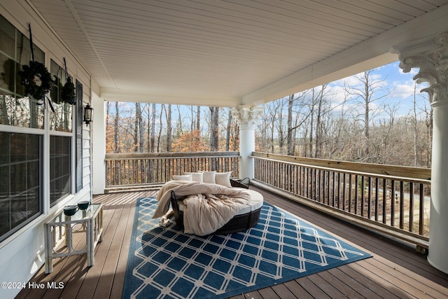 wooden deck featuring a porch