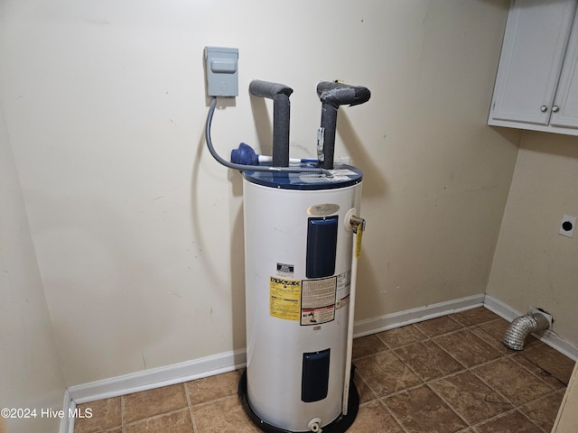 utility room featuring electric water heater