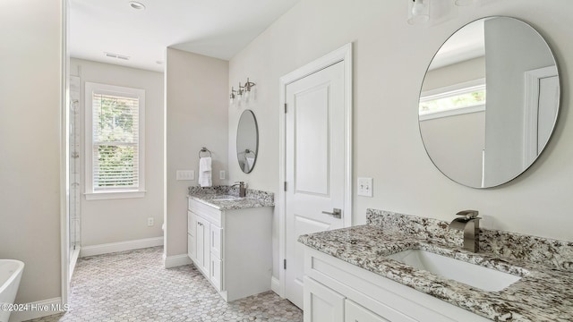 bathroom featuring vanity and tile patterned floors