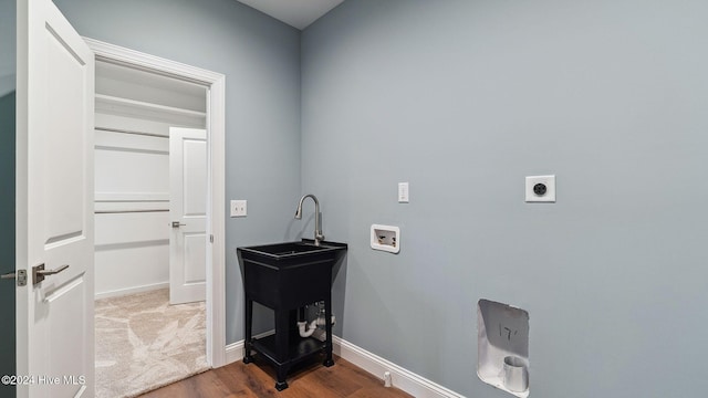 clothes washing area featuring electric dryer hookup and washer hookup