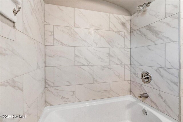 full bath with tub / shower combination