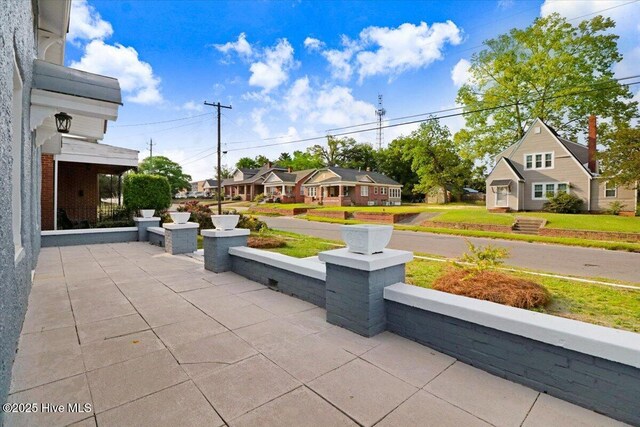 view of patio featuring a residential view