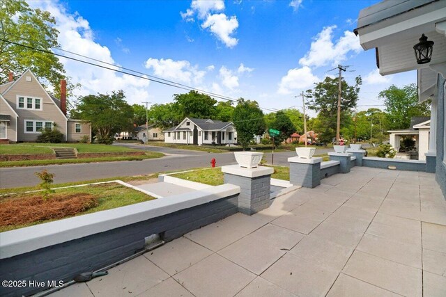 view of patio / terrace with a residential view