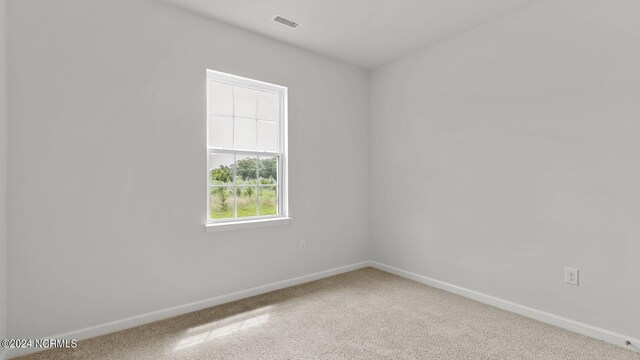 empty room featuring carpet flooring