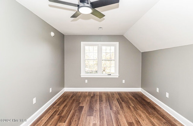 bonus room with dark hardwood / wood-style floors, ceiling fan, and lofted ceiling