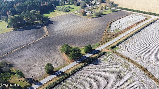 birds eye view of property featuring a rural view