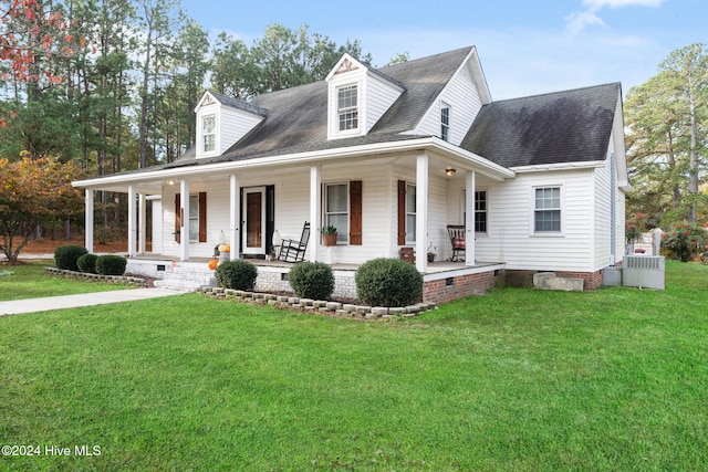 view of front of property with a front lawn and covered porch