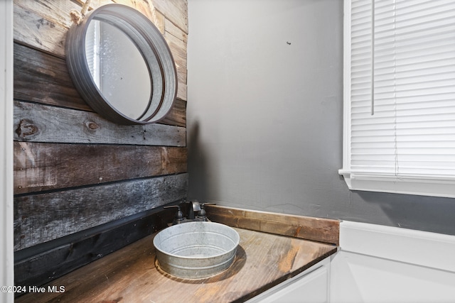 bathroom with vanity and hardwood / wood-style flooring