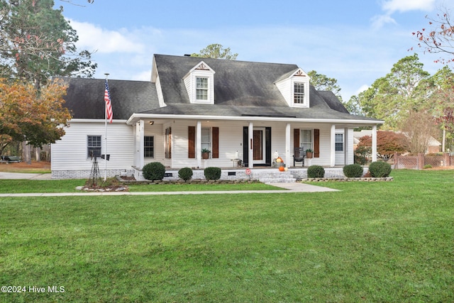 view of front facade featuring a porch and a front lawn