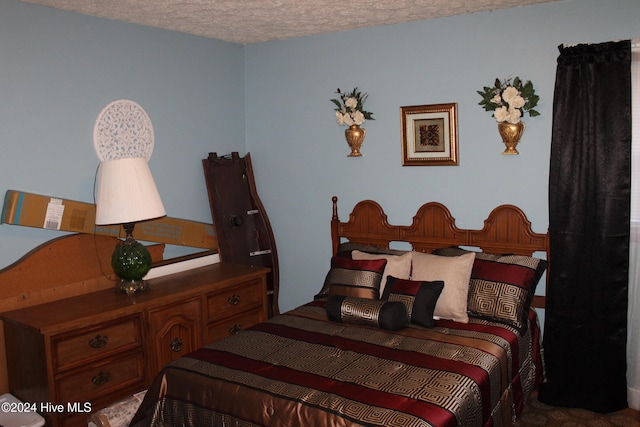 bedroom with a textured ceiling