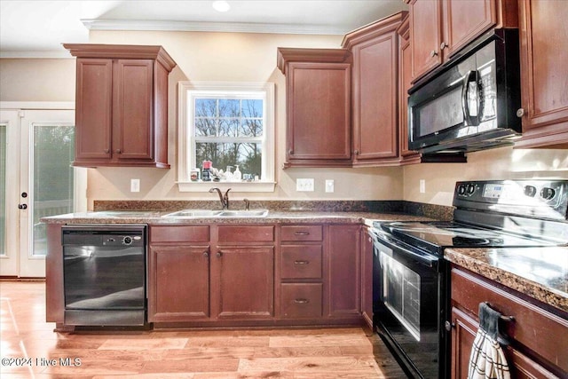 kitchen featuring french doors, black appliances, sink, light hardwood / wood-style flooring, and ornamental molding