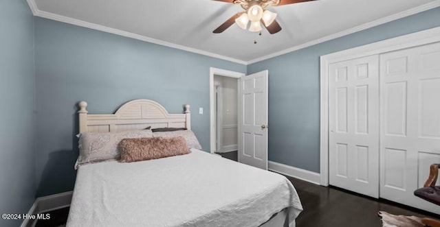 2306 Charles Blvd, Greenville, NC 27858 - bedroom featuring baseboards, ornamental molding, a closet, dark wood-style flooring, and a ceiling fan