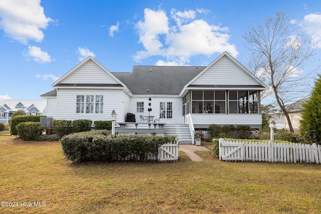 1502 Marsh Pointe, Morehead City, NC 28557 - back of property featuring a sunroom and roof with shingles