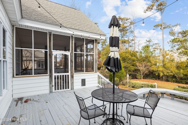 1502 Marsh Pointe, Morehead City, NC 28557 - wooden terrace with a sunroom and outdoor dining area