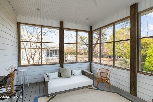 sunroom / solarium featuring plenty of natural light