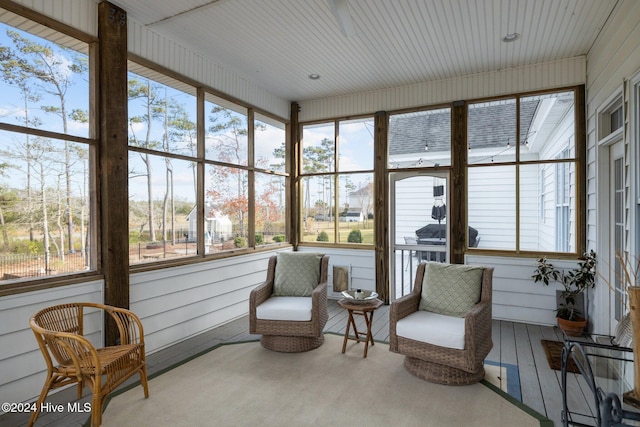 1502 Marsh Pointe, Morehead City, NC 28557 - sunroom / solarium featuring healthy amount of natural light and wooden walls