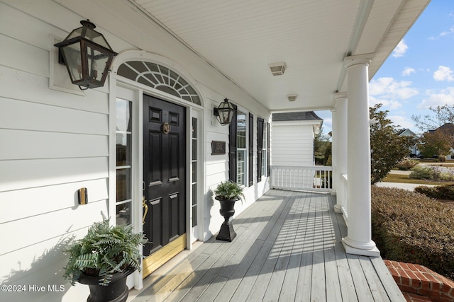 deck with covered porch