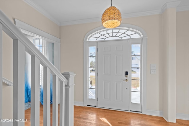 1502 Marsh Pointe, Morehead City, NC 28557 - foyer featuring light wood-style flooring and crown molding