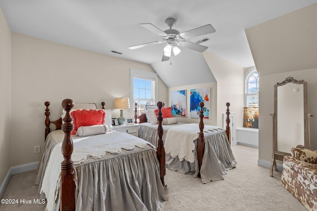 1502 Marsh Pointe, Morehead City, NC 28557 - bedroom featuring light carpet, vaulted ceiling, and a ceiling fan