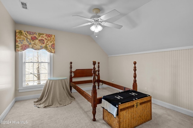1502 Marsh Pointe, Morehead City, NC 28557 - bedroom featuring light carpet, lofted ceiling, and a ceiling fan