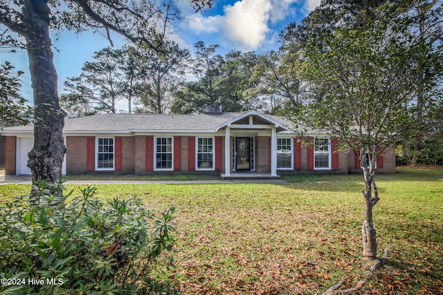 ranch-style home with a front yard