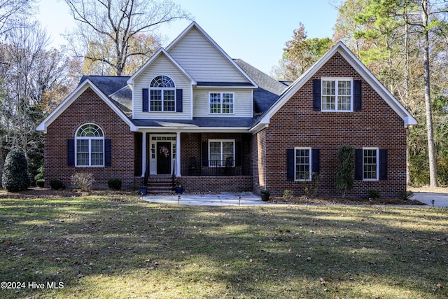 view of front of property with a front lawn