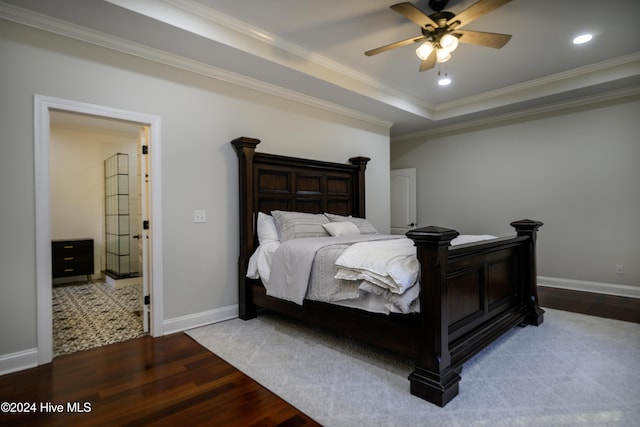 bedroom featuring hardwood / wood-style floors, ceiling fan, and ornamental molding