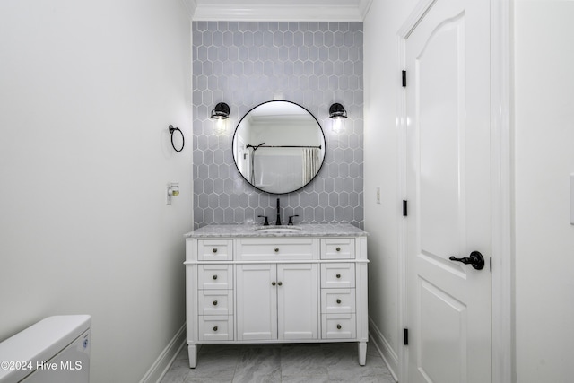 bathroom featuring vanity, tasteful backsplash, toilet, and crown molding