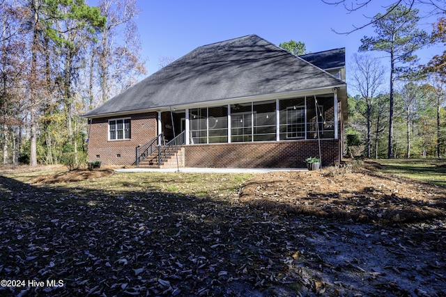 exterior space with a sunroom