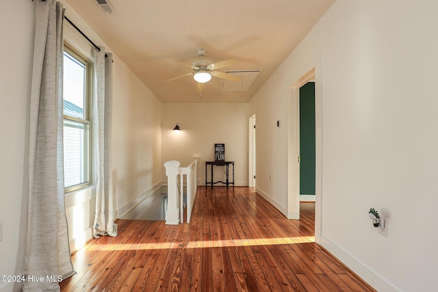 hallway featuring wood-type flooring